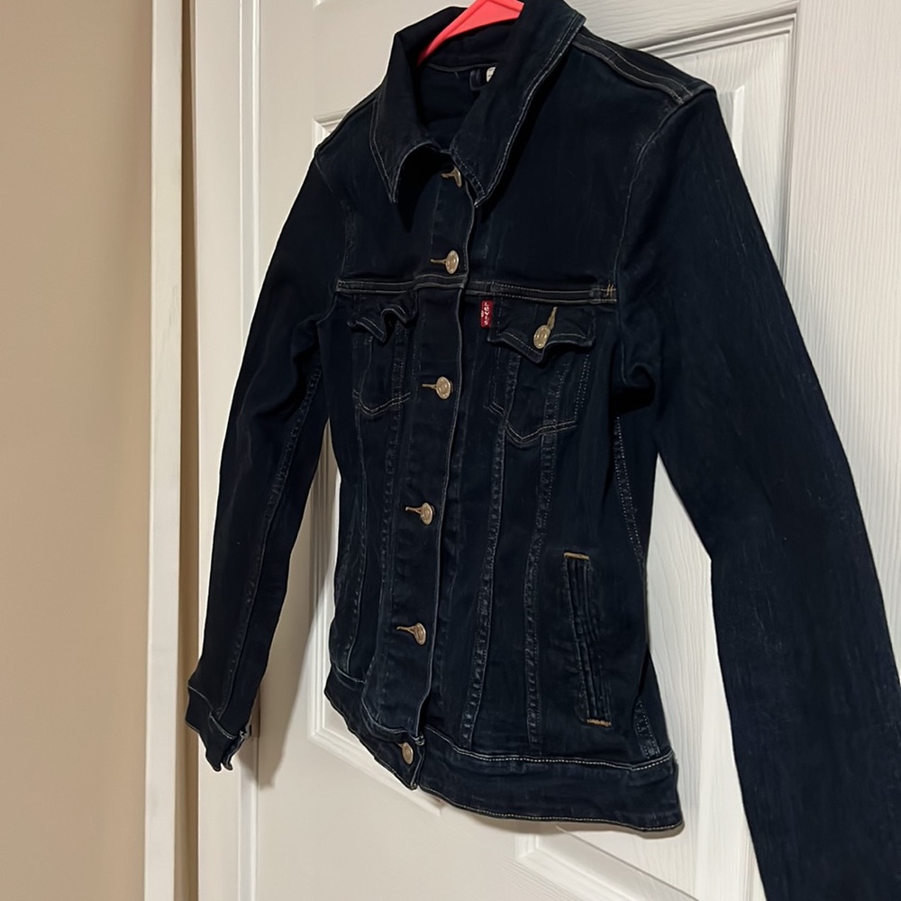 Levi’s Jean Jacket Small. Two button setting for waist (see photos). Gently used